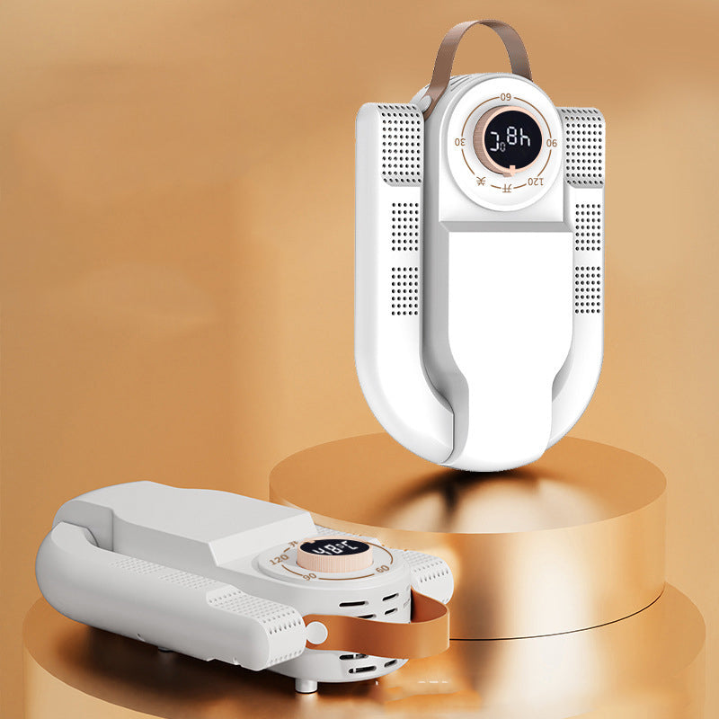Folding shoe dryer with white body, perforated vents, and digital timer display