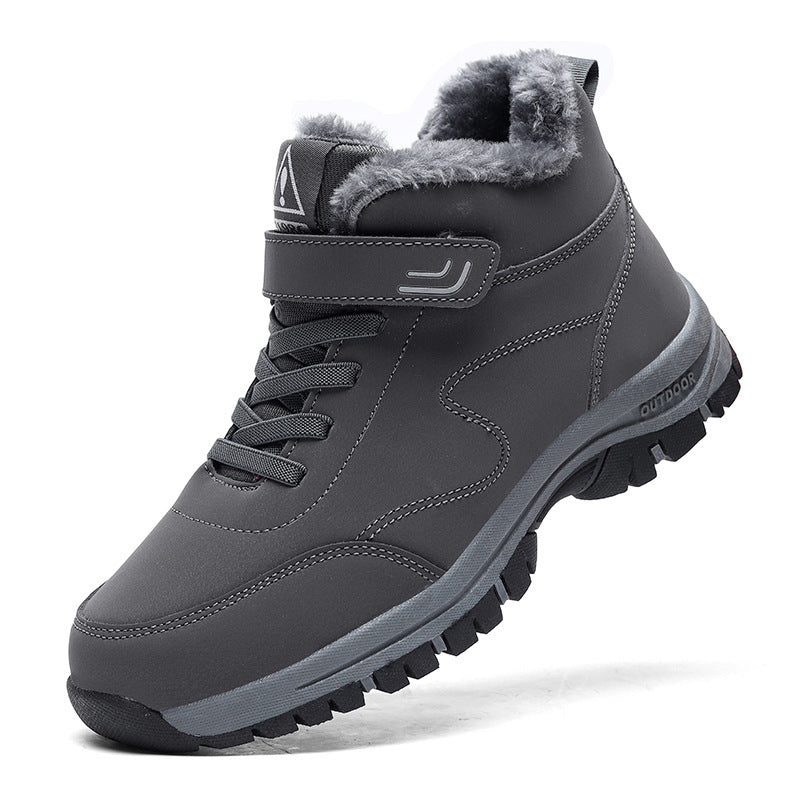 Gray lace-up snow boots with faux fur collar and chunky rubber traction sole