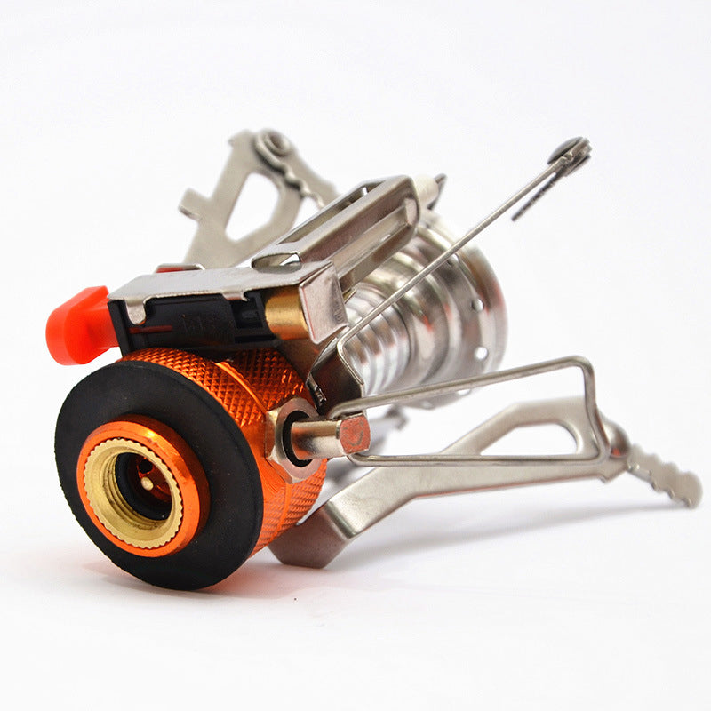 Portable mini camping stove with folding arms, stainless burner and orange base knob