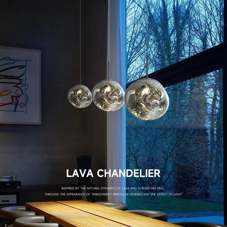 Cluster of chrome spherical acrylic pendant lights with three hanging round globes