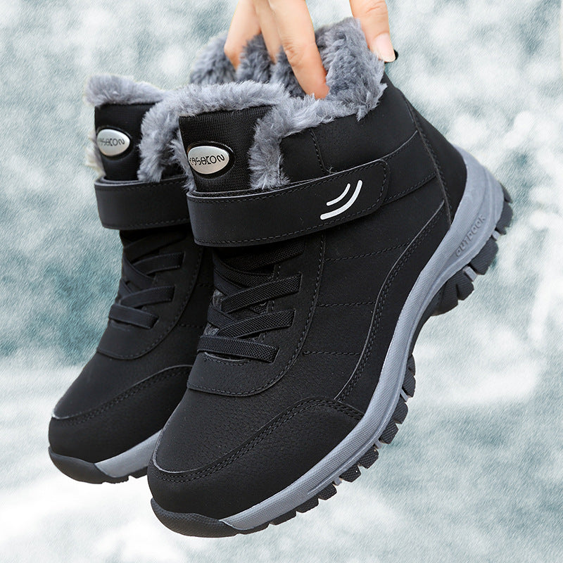 Black mid-top lace-up snow boots with hook-and-loop strap, faux fur trim