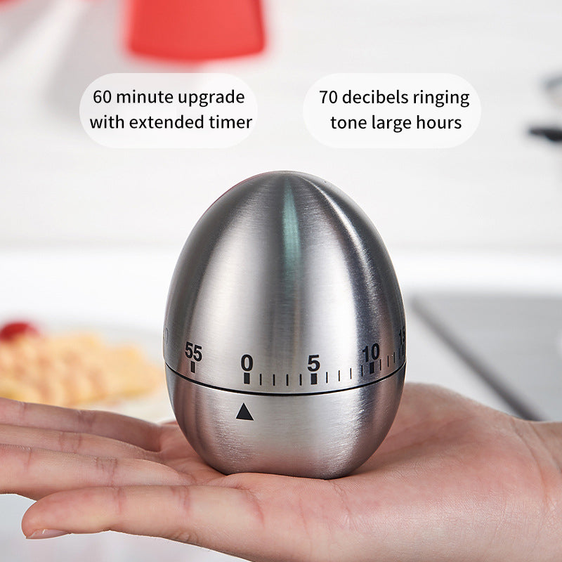 Stainless steel egg-shaped mechanical kitchen timer with numbered countdown dial