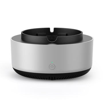 Gray air purifier ashtray with black open top and power button indicator