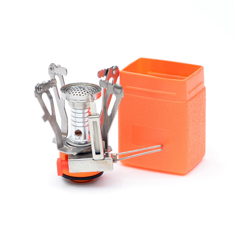 Portable mini camping stove with folding arms and orange carry case