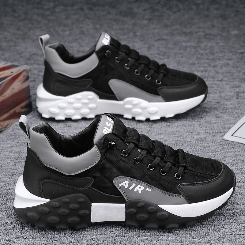 Men's black lace-up sneakers with AIR logo and chunky white tread sole