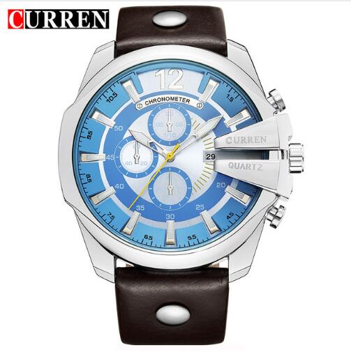 Men's quartz wristwatch with blue dial, silver case, and brown leather strap