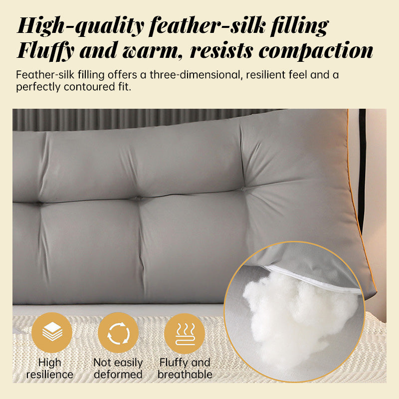 Bed backrest cushion with visible plush filling puff under the cover near the corner.