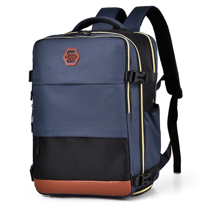 Navy blue and black backpack bag with front logo patch, yellow trim, and brown bottom