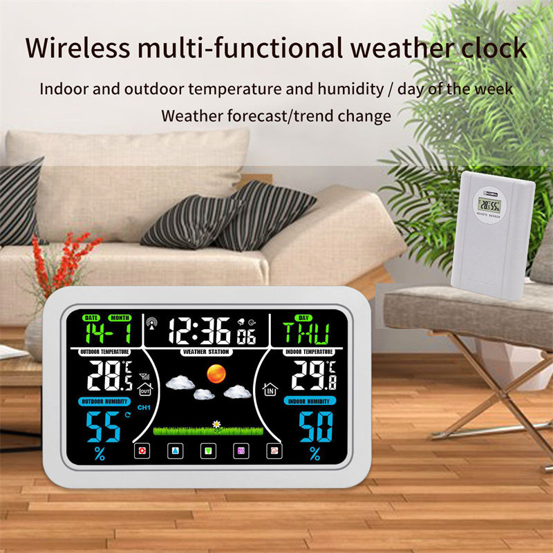 White wireless weather clock with color screen showing temperature and humidity