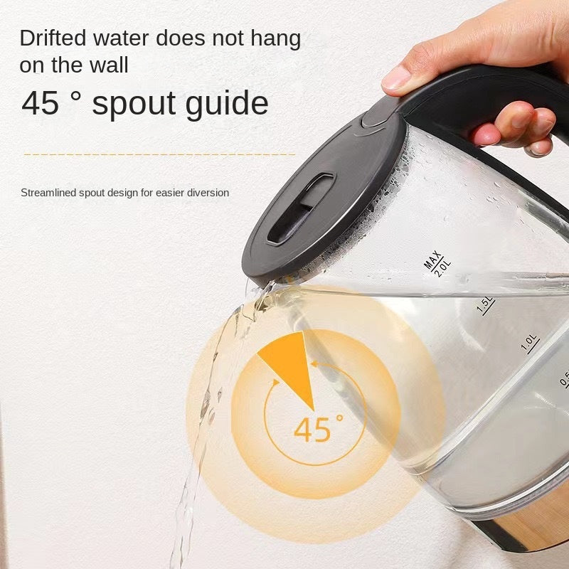 Black glass kettle with pouring spout and 45° guide, hand holding the handle