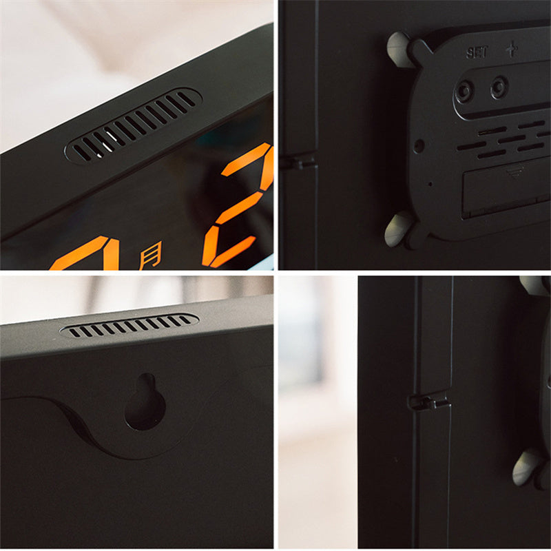 LED wall clock close-up with side vent slots and SET control buttons