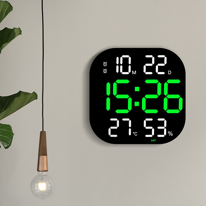 LED countdown wall clock, black face with green digital numerals and humidity/percent readout