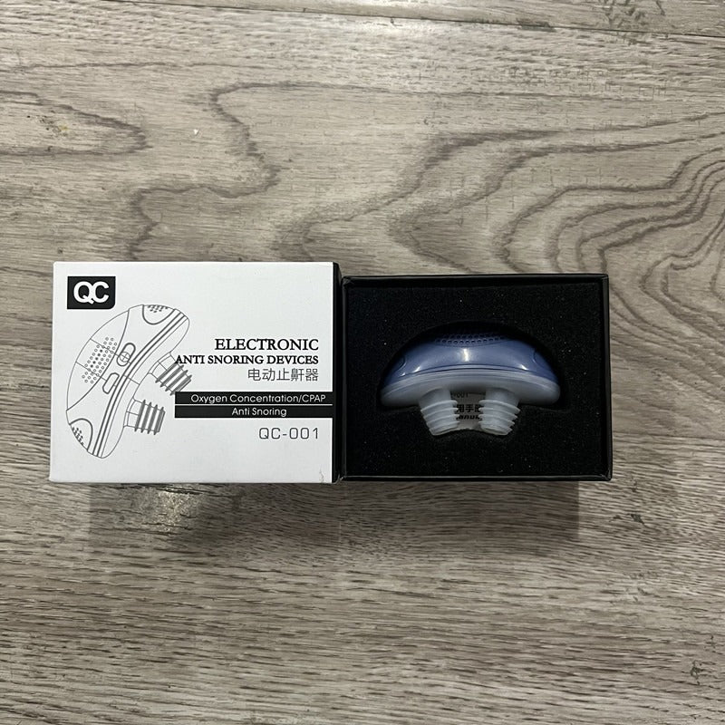 Blue electronic anti snoring device with mouthpiece in black presentation box.