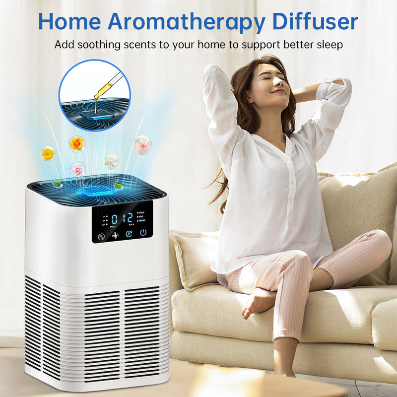 White desktop air purifier beside sofa, with top grille and front control screen