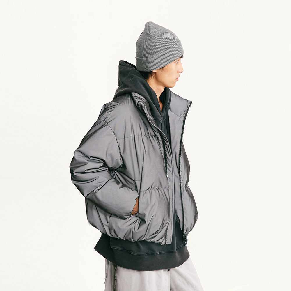 Black stand-collar down jacket with zip front and padded reflective texture