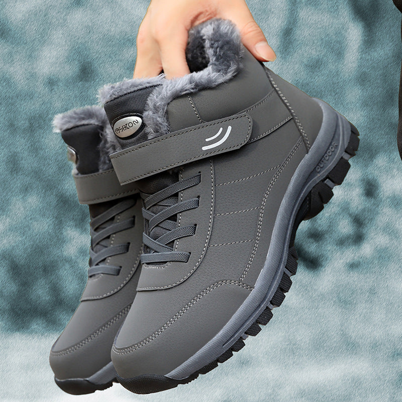Gray lace-up snow boots with faux fur collar and grippy rubber outsole