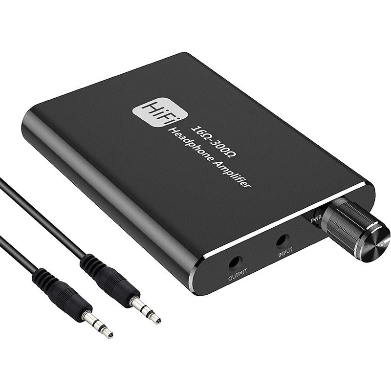 Black portable headphone amplifier with input/output jacks and 3.5 mm audio cables