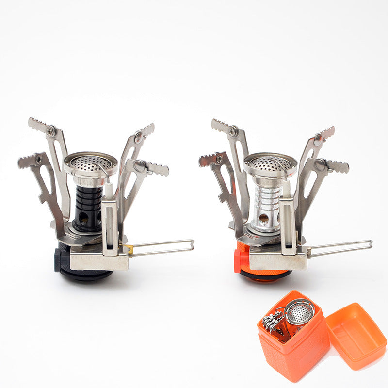 Two portable mini camping stoves with folding stands and stainless burners, orange and black bases