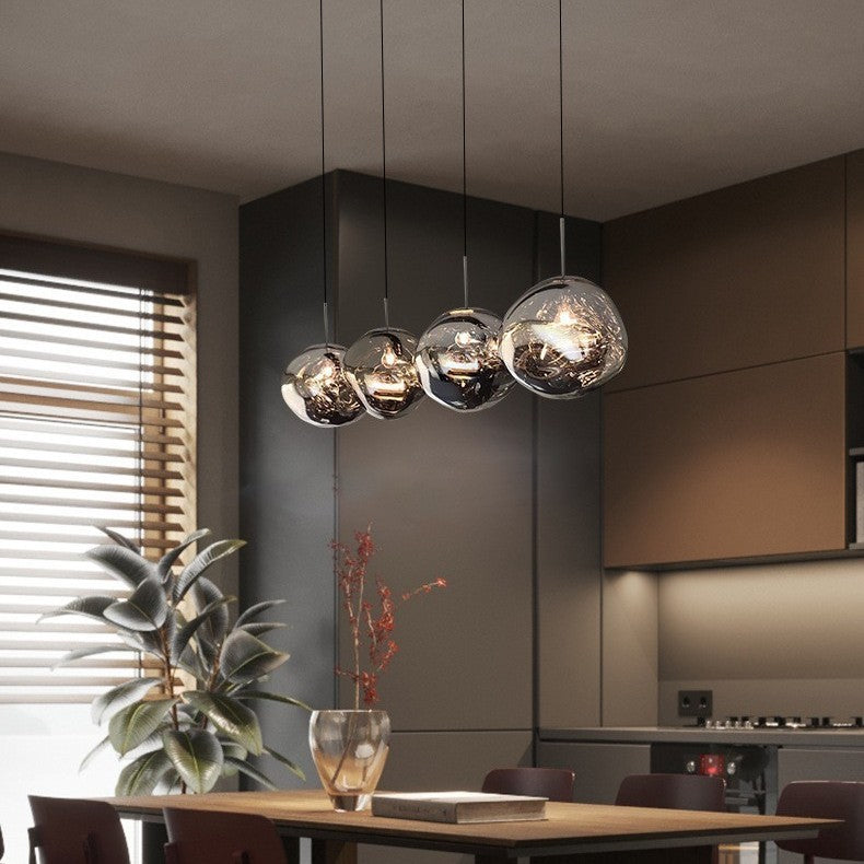 Chrome spherical acrylic pendant light fixture with multiple hanging glass-like globes
