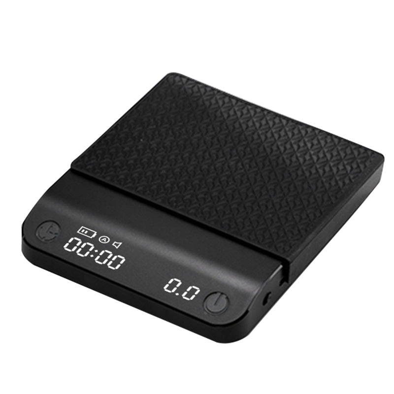 Black coffee electronic scale with textured top panel and digital readout