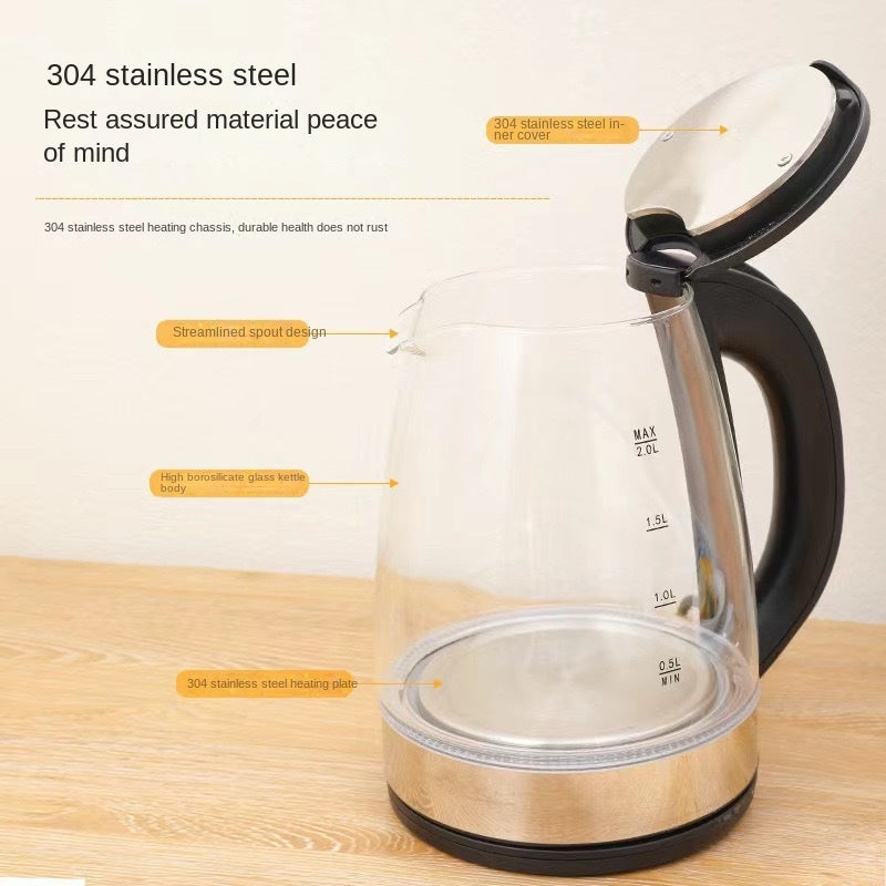 Transparent glass electric kettle with black lid, handle, and stainless-steel heating base