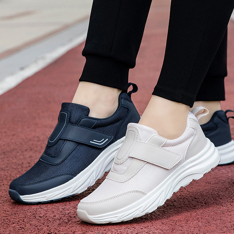 Men's walking shoes pair, white and dark navy mesh with hook-and-loop straps